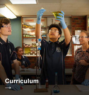 Teacher and students conducting a science experiment