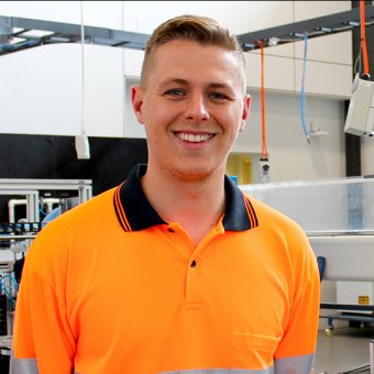 Student wearing high visibility shirt in TAFE training facility