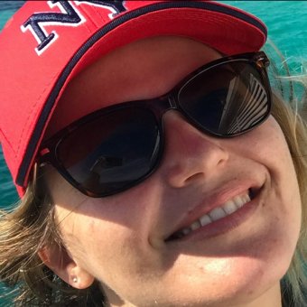 Student Romy selfie against ocean backdrop